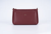 A shoulder bag for women that exudes an abundance of charm- red
