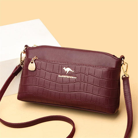 Fashionable women's handbag of flexible leather - Wine red