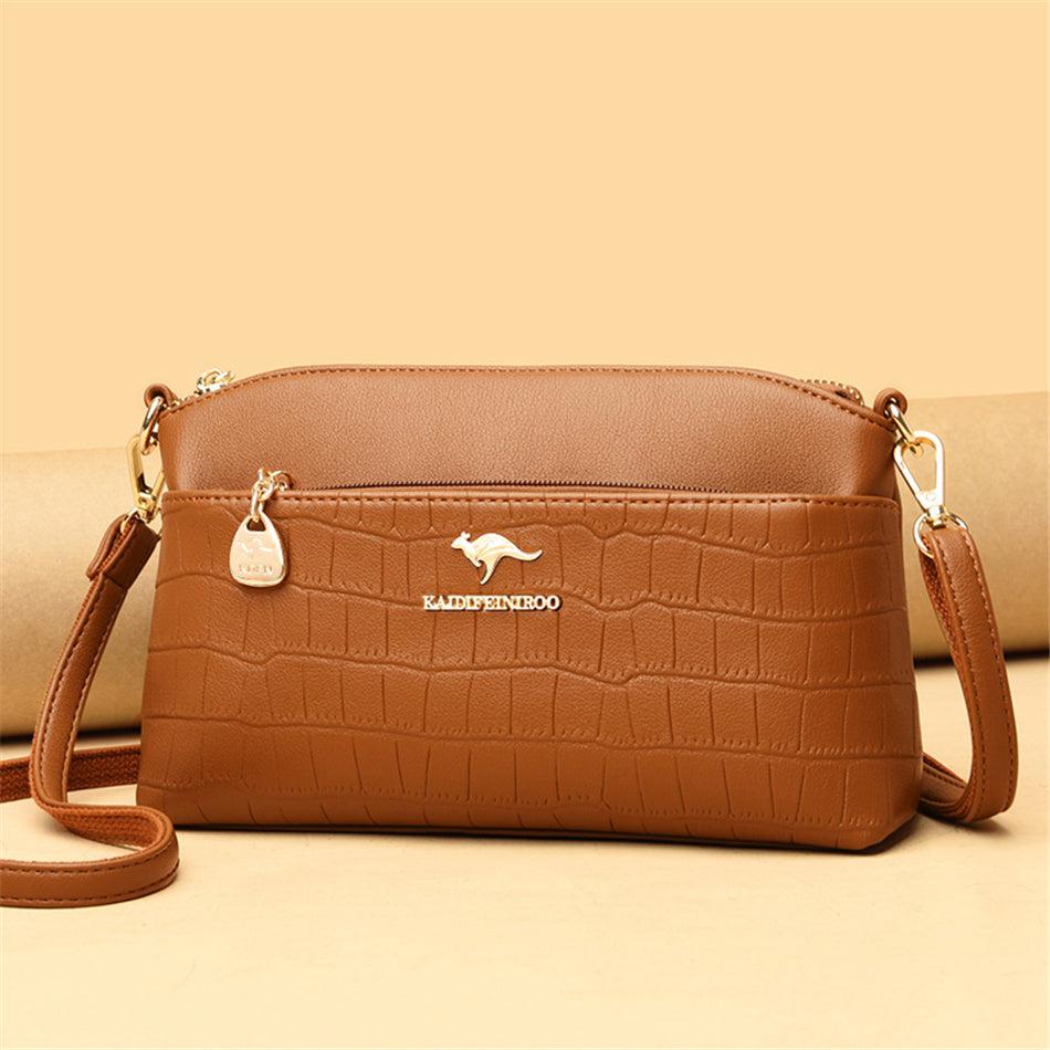 Fashionable women's handbag of flexible leather - brown