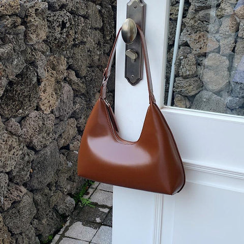 Small Curved Leather Handbag - Brown